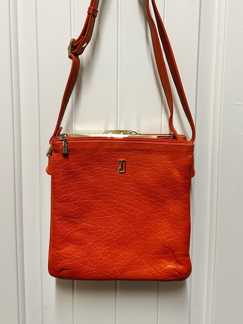 Jafferjees Orange Leather Crossbody Bag with Gold Accents